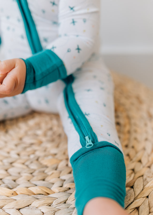 Baby Wearing Luna Luz Two-Way Zip Romper in Fly Away Color