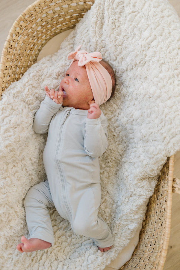 Baby Wearing Luna Luz Romper and Headband