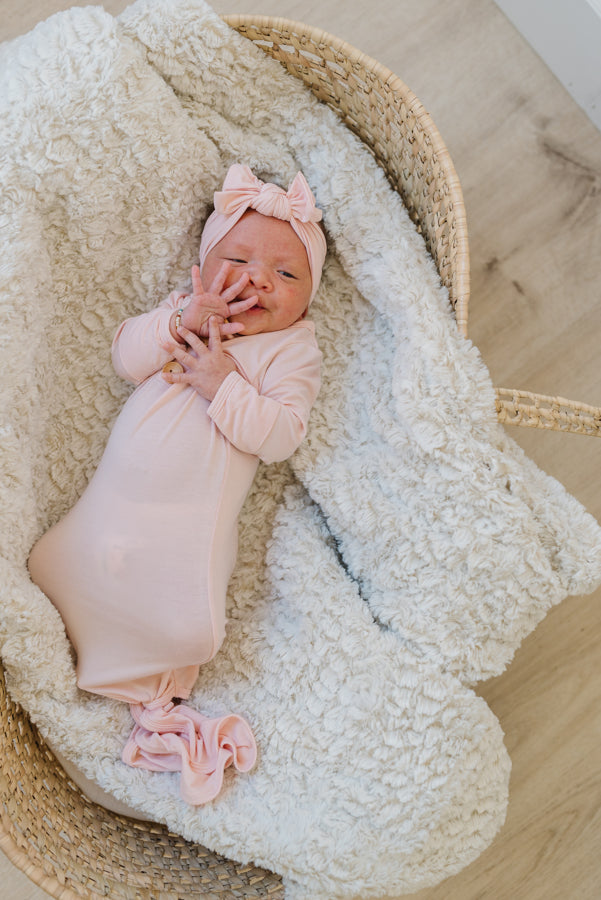 Baby Wearing Luna Luz Bow Headband and Knotted Gown in Bubble Gum