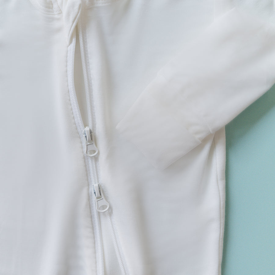 Luna Luz Two-Way Zip Pajama Romper in Snow Color With Double Zip and Fold-Over Mittens at Wrists